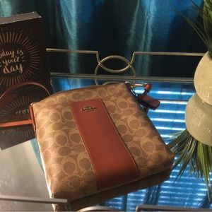 Coach crossbody bag. I wore 4-5 times. Excellent condition. Super clean.